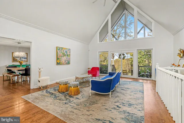 a view of a living room and a large window
