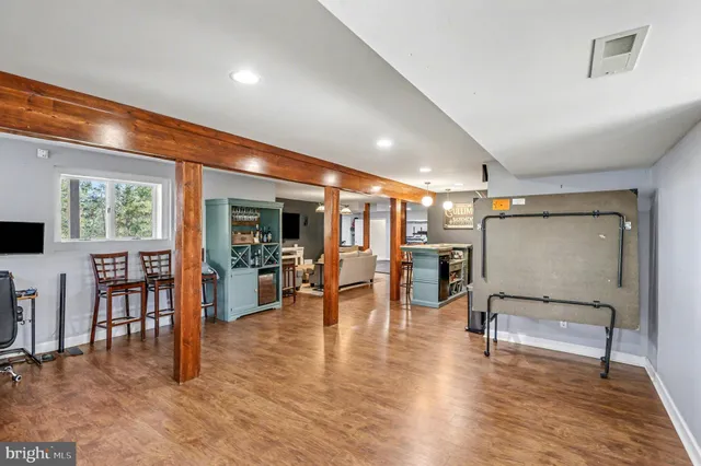 a view of balcony with furniture and trees