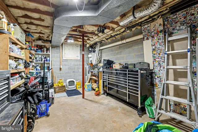 a view of a lake and green valley