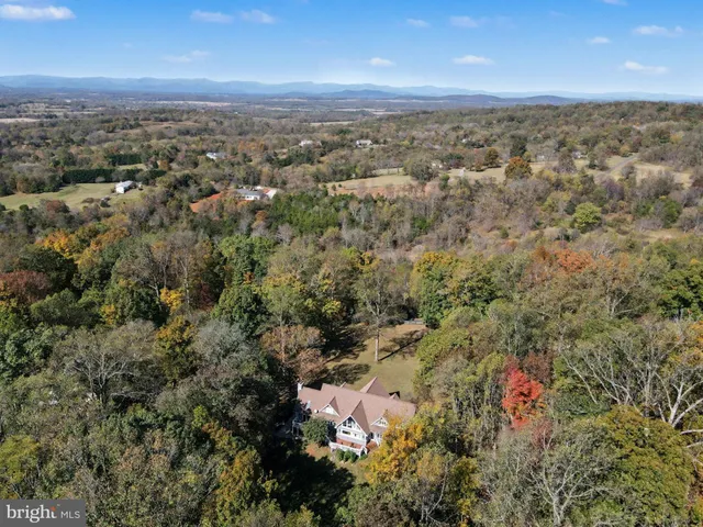 a picture of a bathroom with a refrigerator