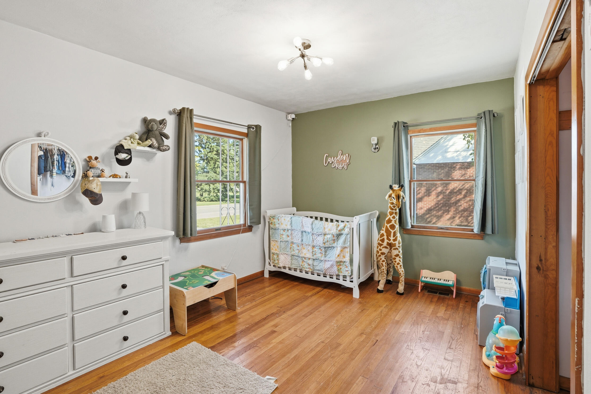 705 East Grace Street Rensselaer, IN 47978 - Photo 12 of 32 a bedroom with furniture and a window