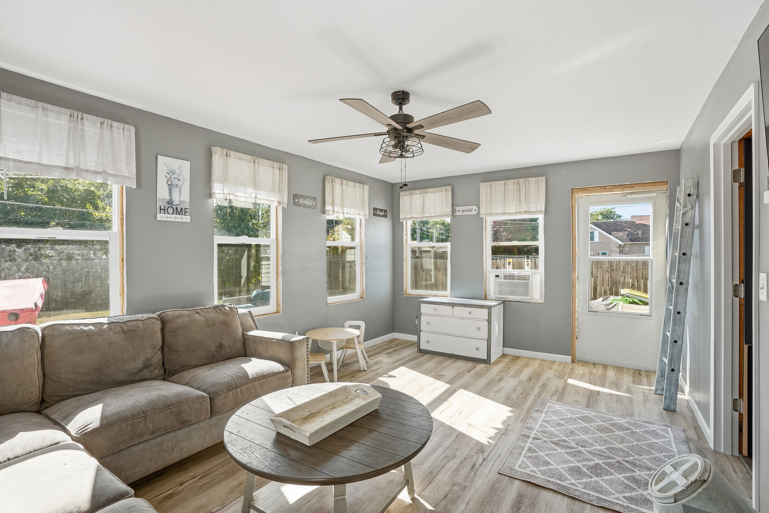 705 East Grace Street Rensselaer, IN 47978 - Photo 18 of 32 a living room with furniture and a large window