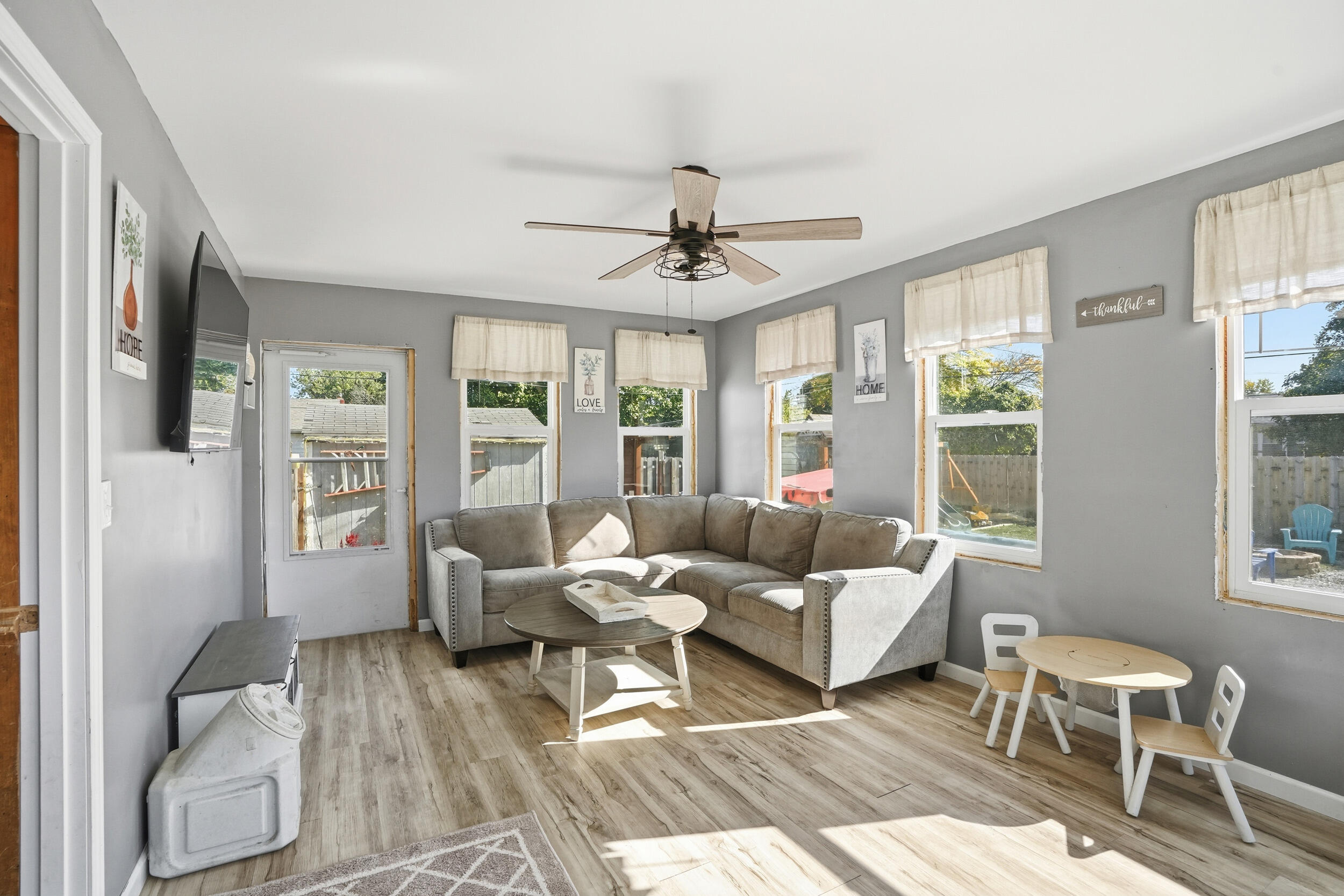 705 East Grace Street Rensselaer, IN 47978 - Photo 19 of 32 a living room with furniture and a window
