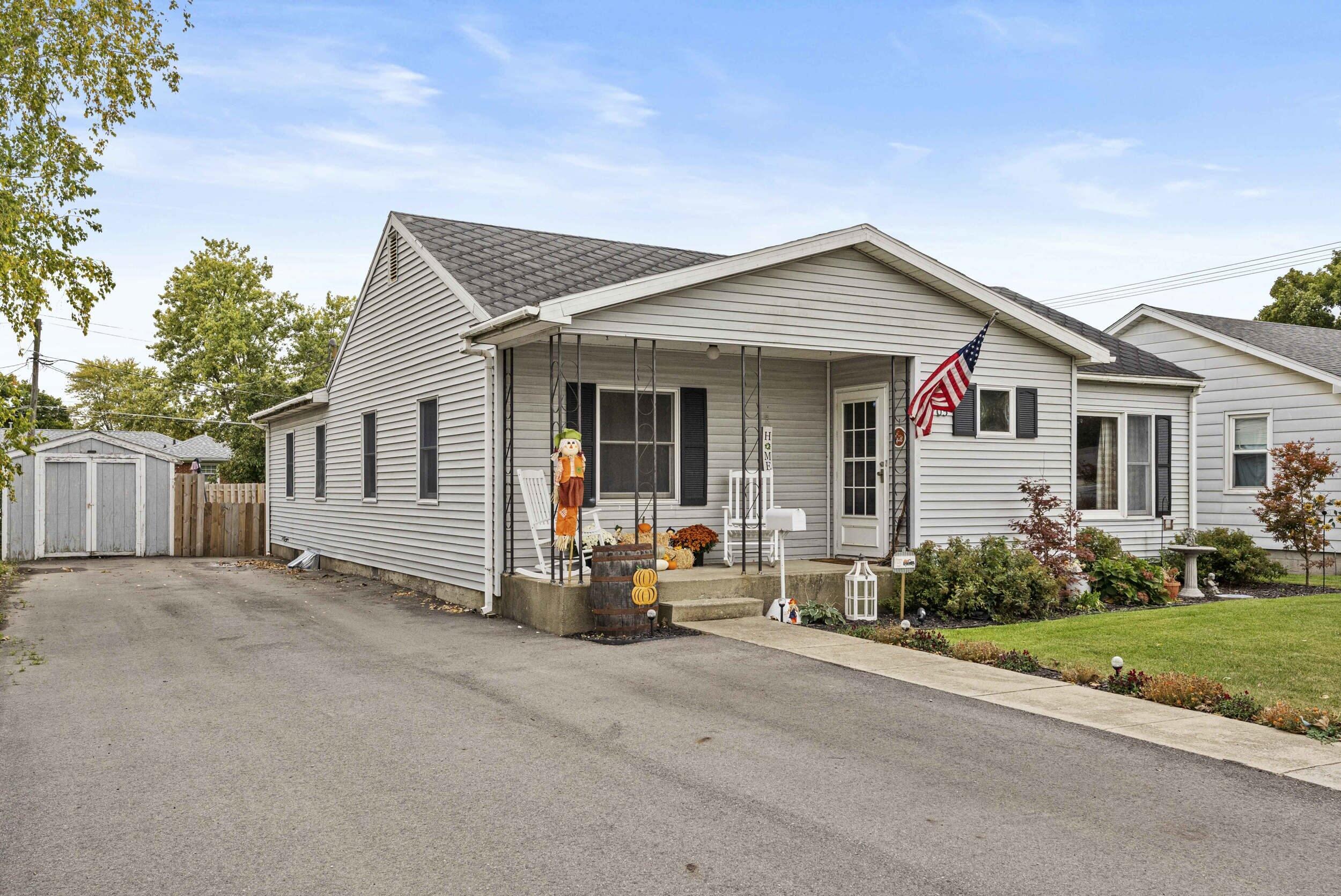705 East Grace Street Rensselaer, IN 47978 - Photo 2 of 32 front view of a house with a patio
