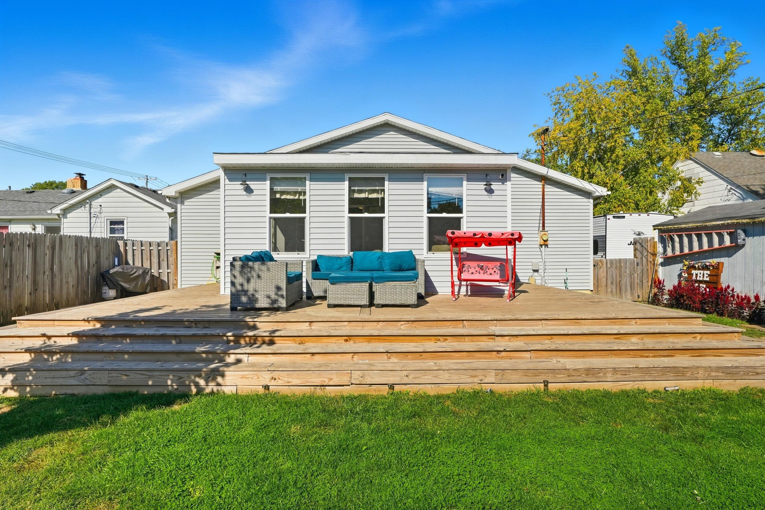 705 East Grace Street Rensselaer, IN 47978 - Photo 21 of 32 a front view of a house with a yard