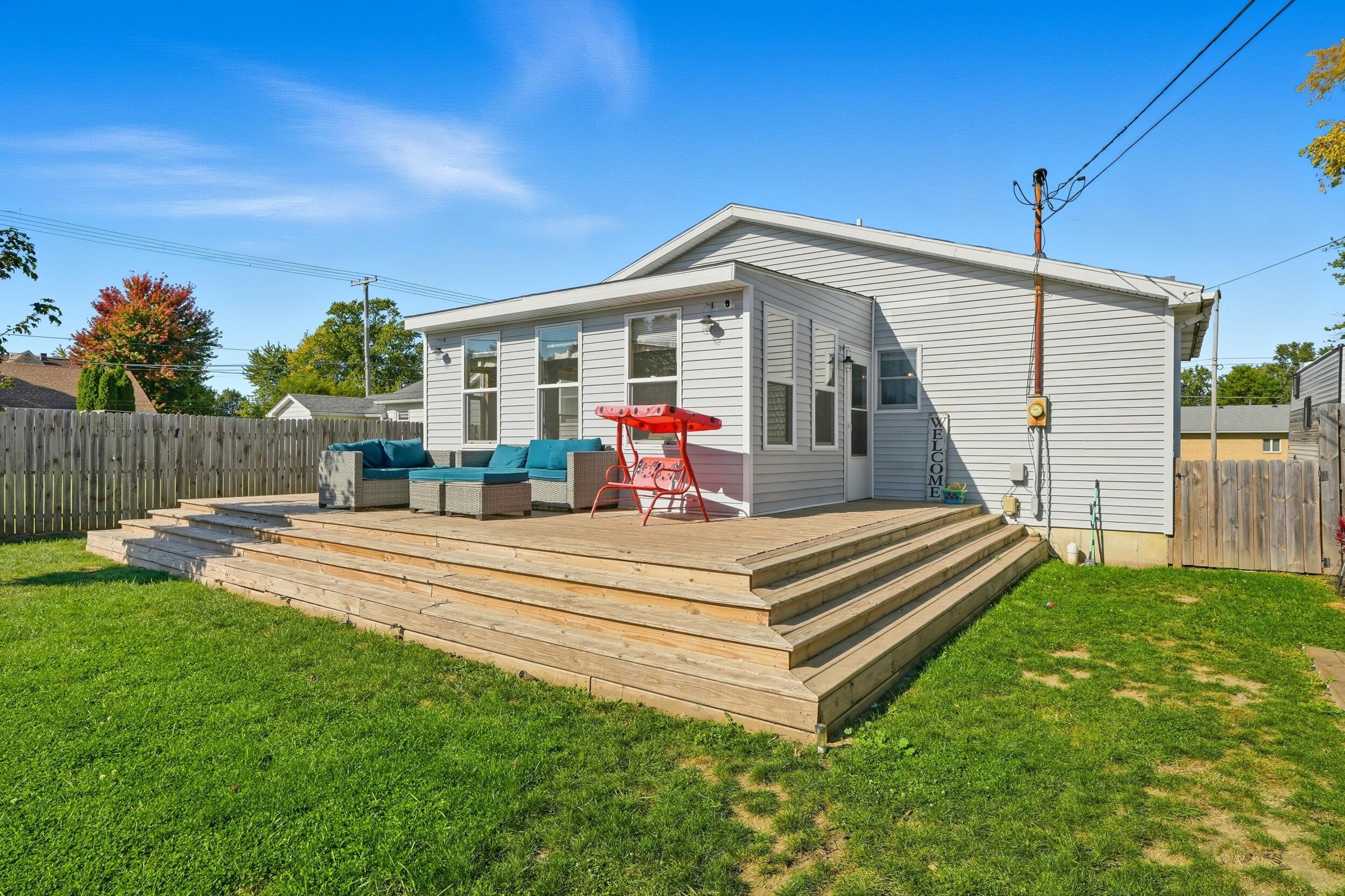 705 East Grace Street Rensselaer, IN 47978 - Photo 22 of 32 a view of a house with a park