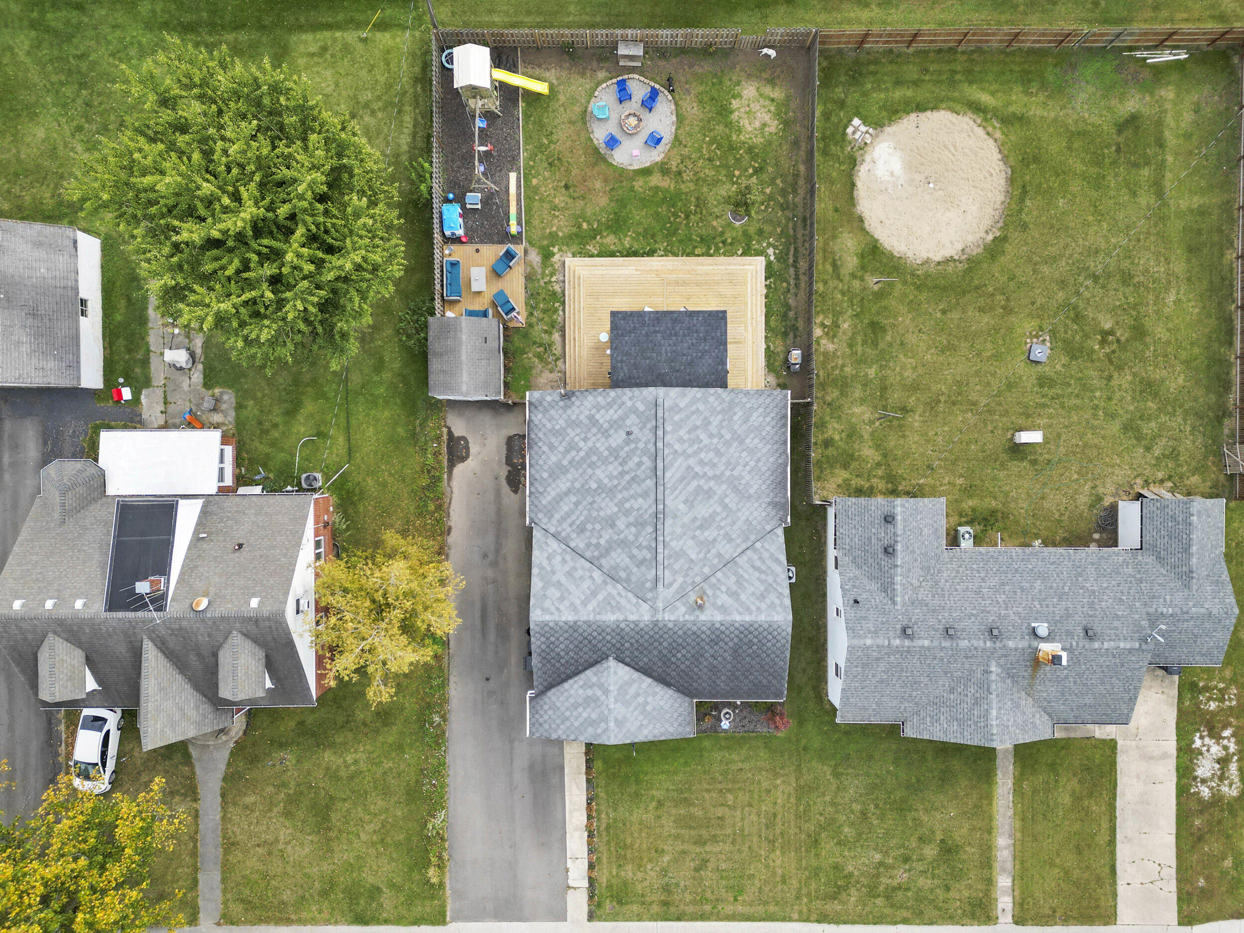 705 East Grace Street Rensselaer, IN 47978 - Photo 29 of 32 an aerial view of a house with garden space and a fountain