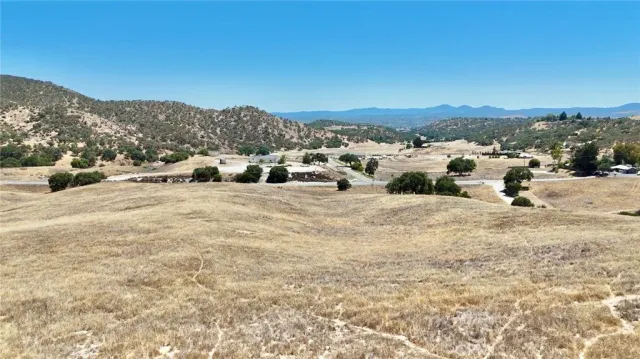 a view of balcony with wooden floor and city view