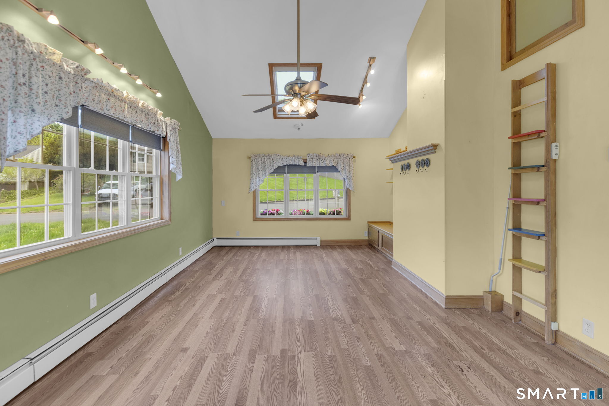 102 Wayne Lane Meriden, CT 06450 - Photo 29 of 36 wooden floor in an empty room with a window