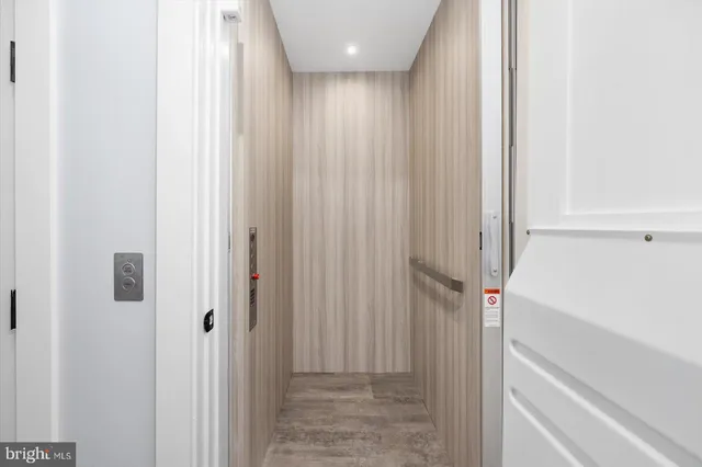 a view of a balcony with wooden floor