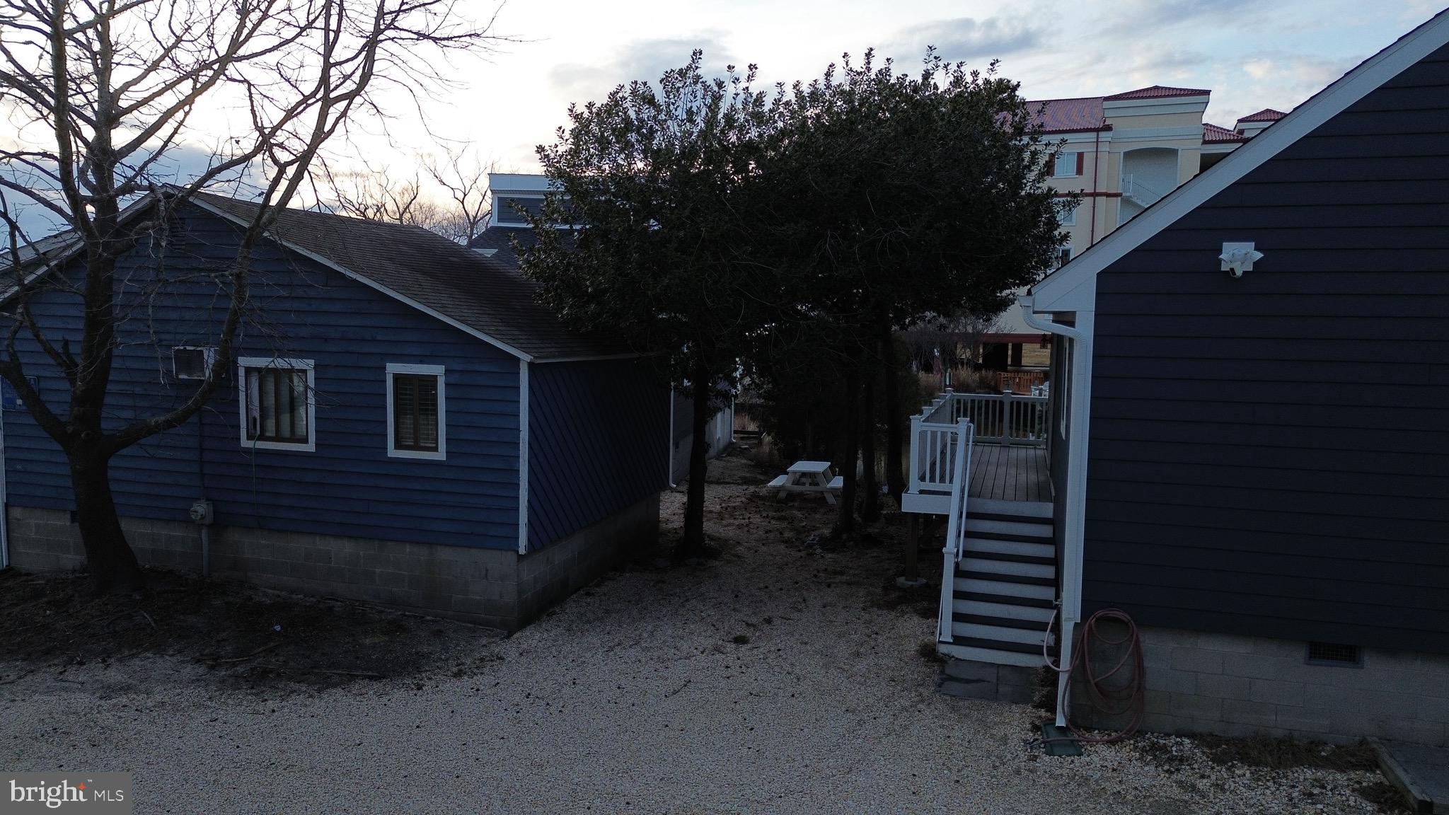 114 75th Street Ocean City, MD 21842 - Photo 11 of 11 a view of a house with a yard