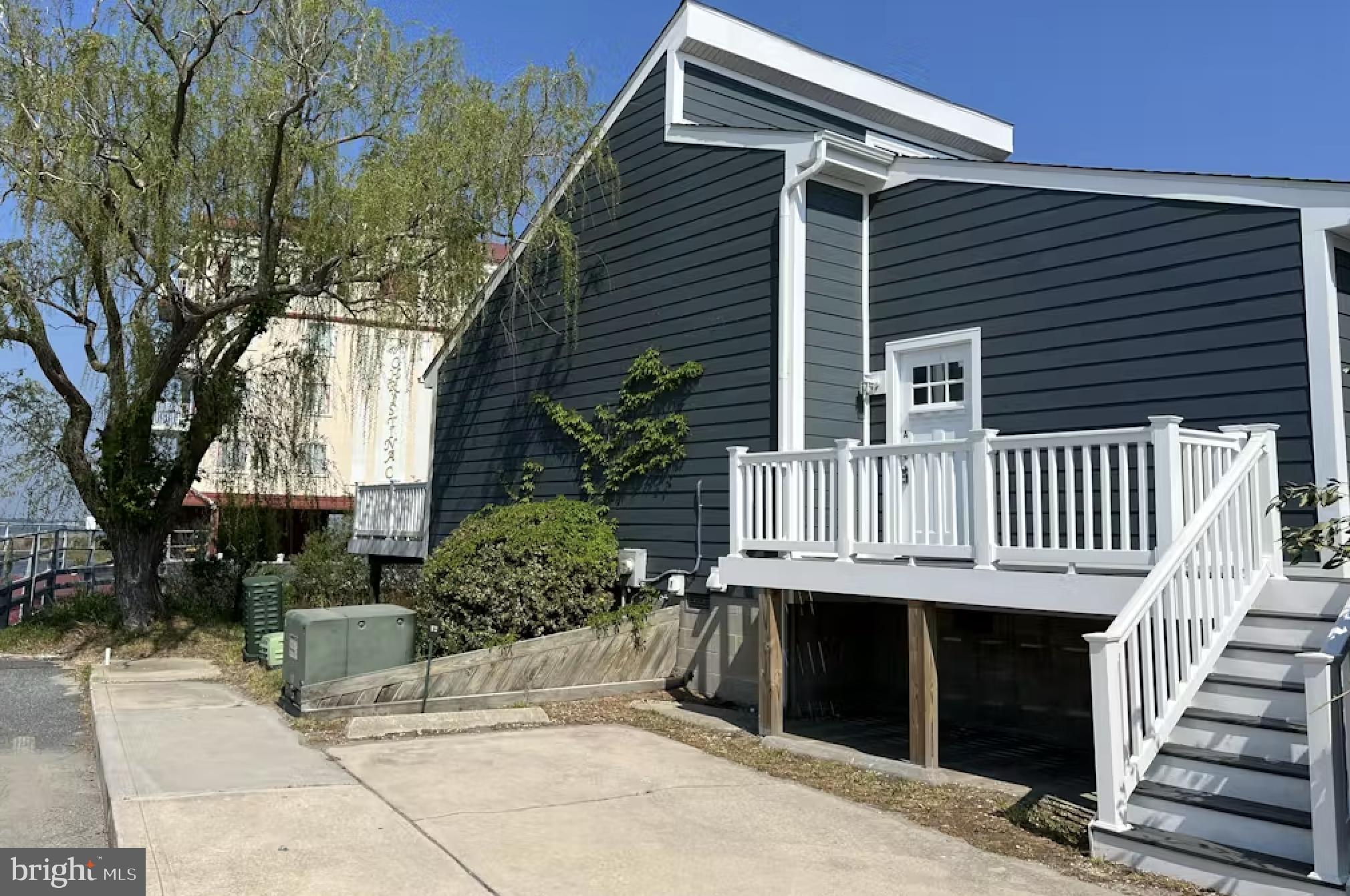 114 75th Street Ocean City, MD 21842 - Photo 4 of 11 a view of deck with patio