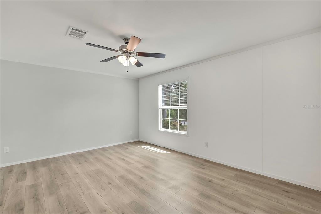 5342 South Isabel Terrace Homosassa, FL 34446 - Photo 14 of 23 a view of an empty room with a window
