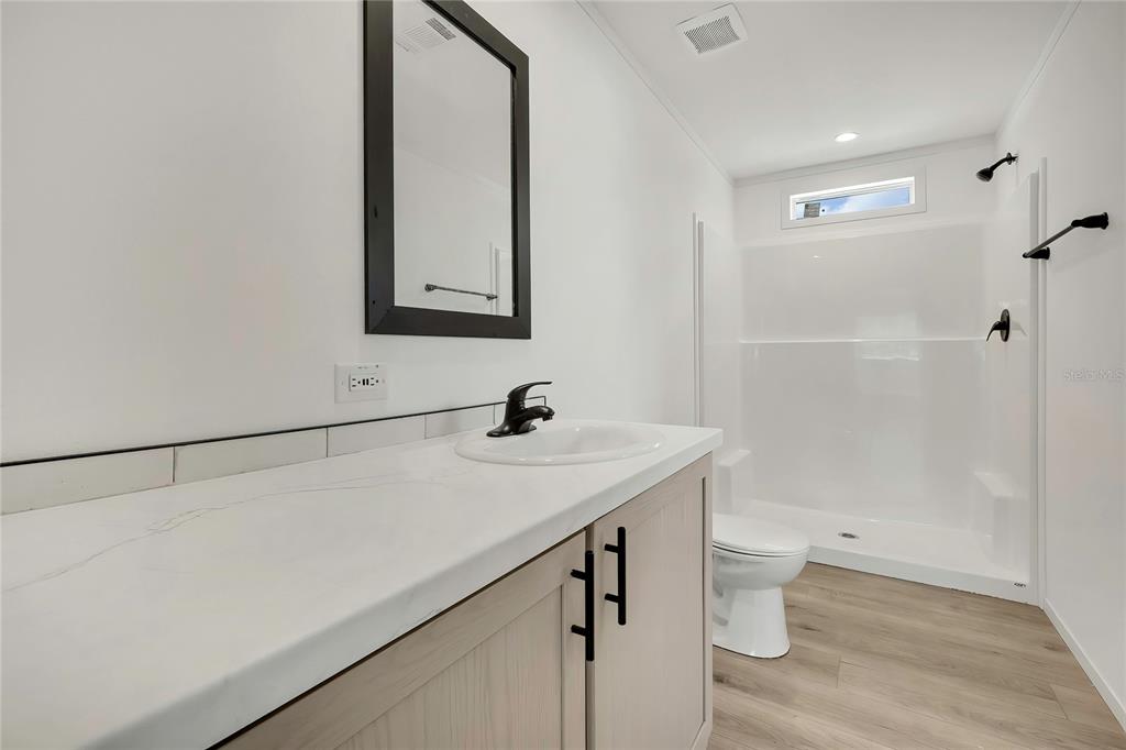 5342 South Isabel Terrace Homosassa, FL 34446 - Photo 17 of 23 a bathroom with a sink and a mirror