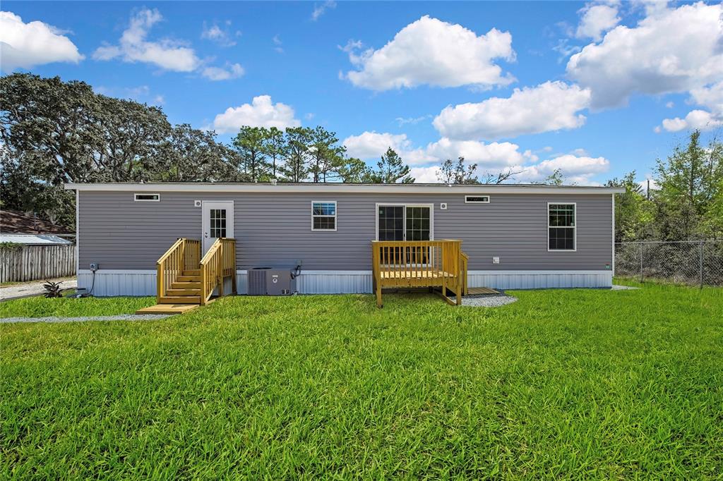 5342 South Isabel Terrace Homosassa, FL 34446 - Photo 2 of 23 a view of a house with backyard