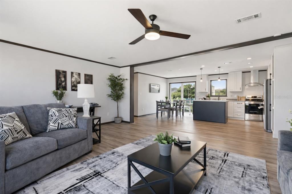 5342 South Isabel Terrace Homosassa, FL 34446 - Photo 22 of 23 a living room with furniture and kitchen view