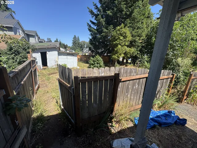 a view of backyard of house