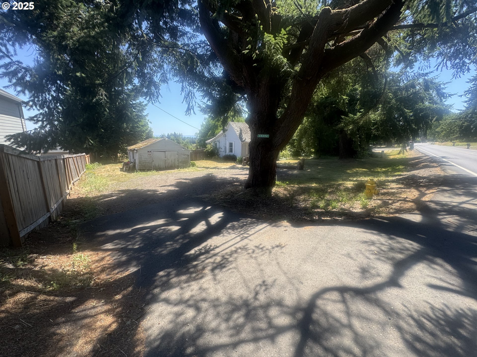 35092 Pittsburg Road St. Helens, OR 97051 - Photo 3 of 35 a view of a yard with a tree