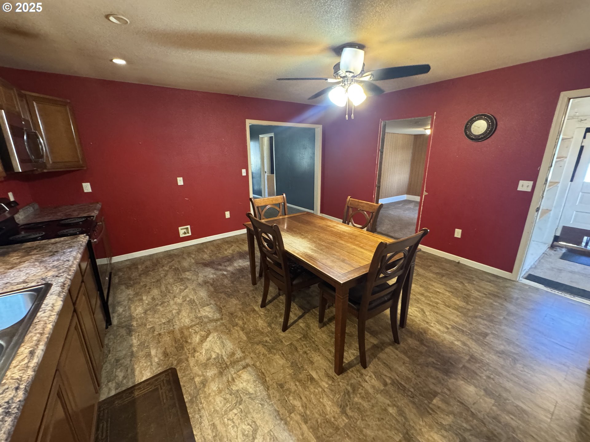35092 Pittsburg Road St. Helens, OR 97051 - Photo 9 of 35 a room with a table chairs and wooden floor