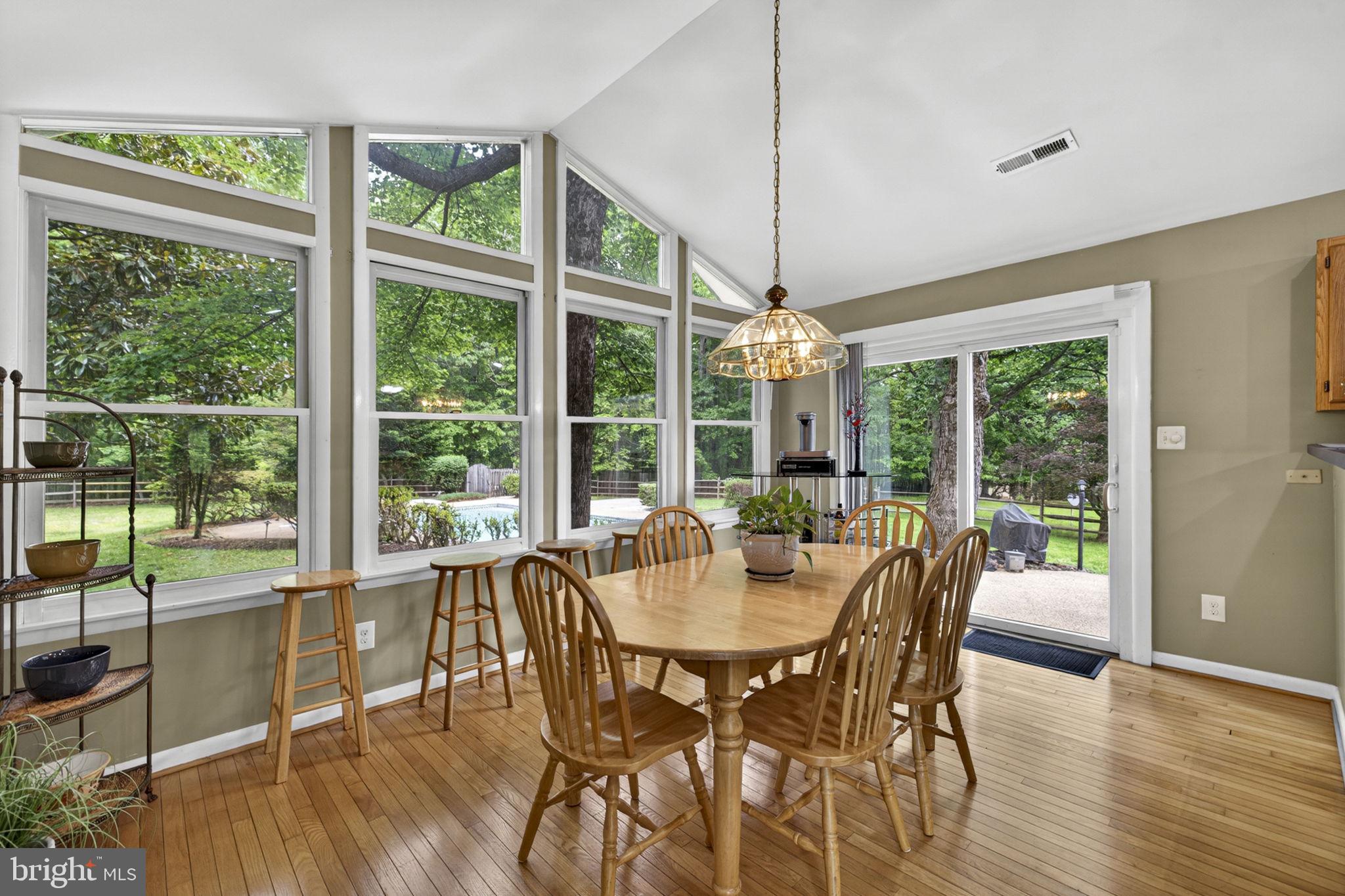 41726 Stumptown Road Leesburg, VA 20176 - Photo 19 of 91 Dining Room Overlooking Back Yard Pool Oasis