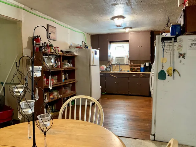 a bedroom with a bed and dresser