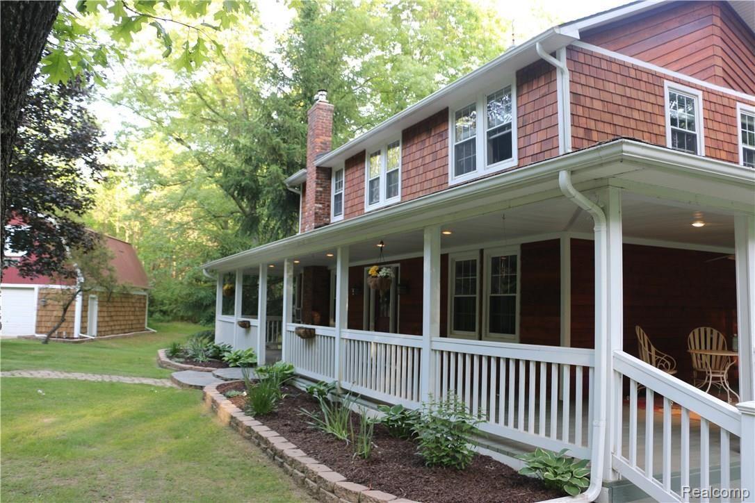 9404 Mabley Hill Road Fenton, MI 48430 - Photo 10 of 46 Wrap-around front porch.