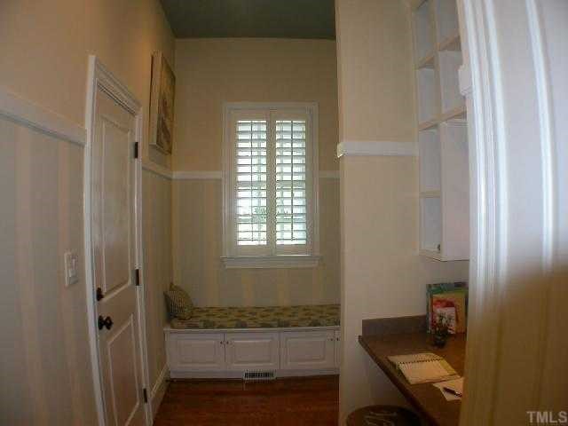 1922 Kirkwood Ridge Drive Raleigh, NC 27612 - Photo 6 of 12 a bathroom with a sink and a mirror