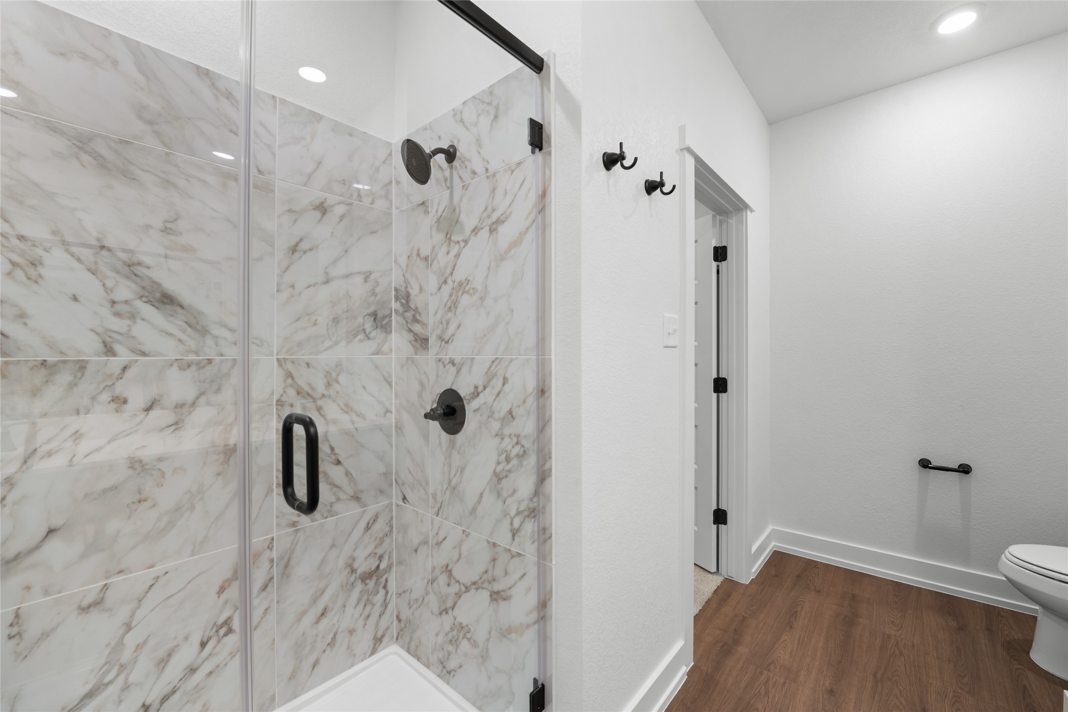 560 Gus Loop Georgetown, TX 78626 - Photo 9 of 17 a bathroom with a shower