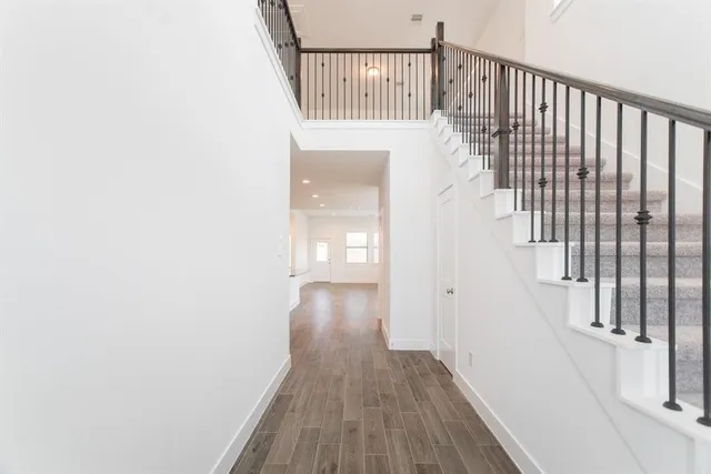 a view of entryway with wooden floor