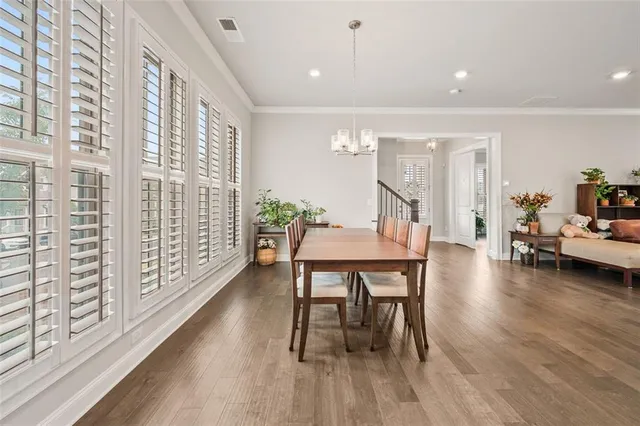 a large kitchen with stainless steel appliances lots of counter top space
