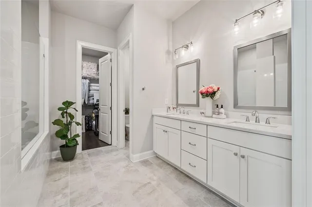 a view of a patio with table and chairs and potted plants