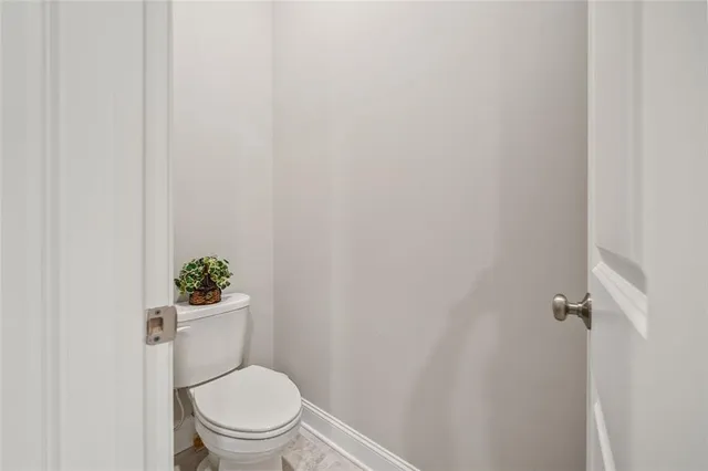 a view of entryway and hall with dining room