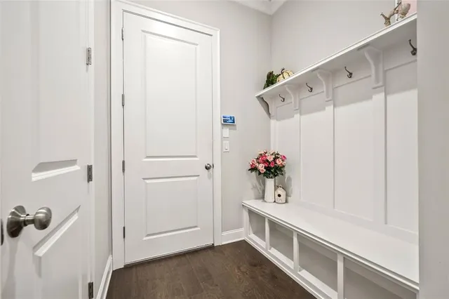 a bedroom with a bed and a table