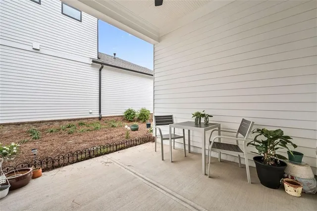 a spacious bathroom with a double vanity sink and a mirror
