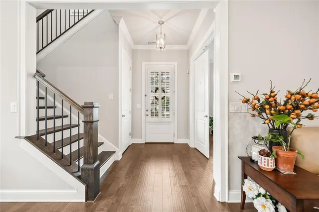 a view of entryway with wooden floor
