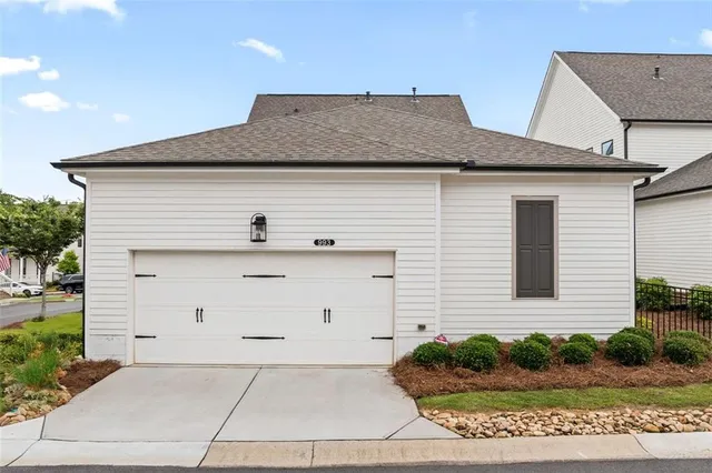 a view of a balcony with chairs