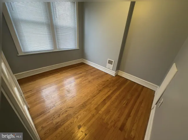 a bathroom with a toilet and a bathtub