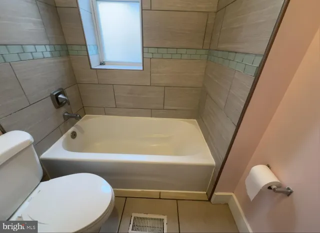 a bathroom with a sink and toilet