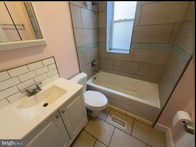 a view of backyard with green space