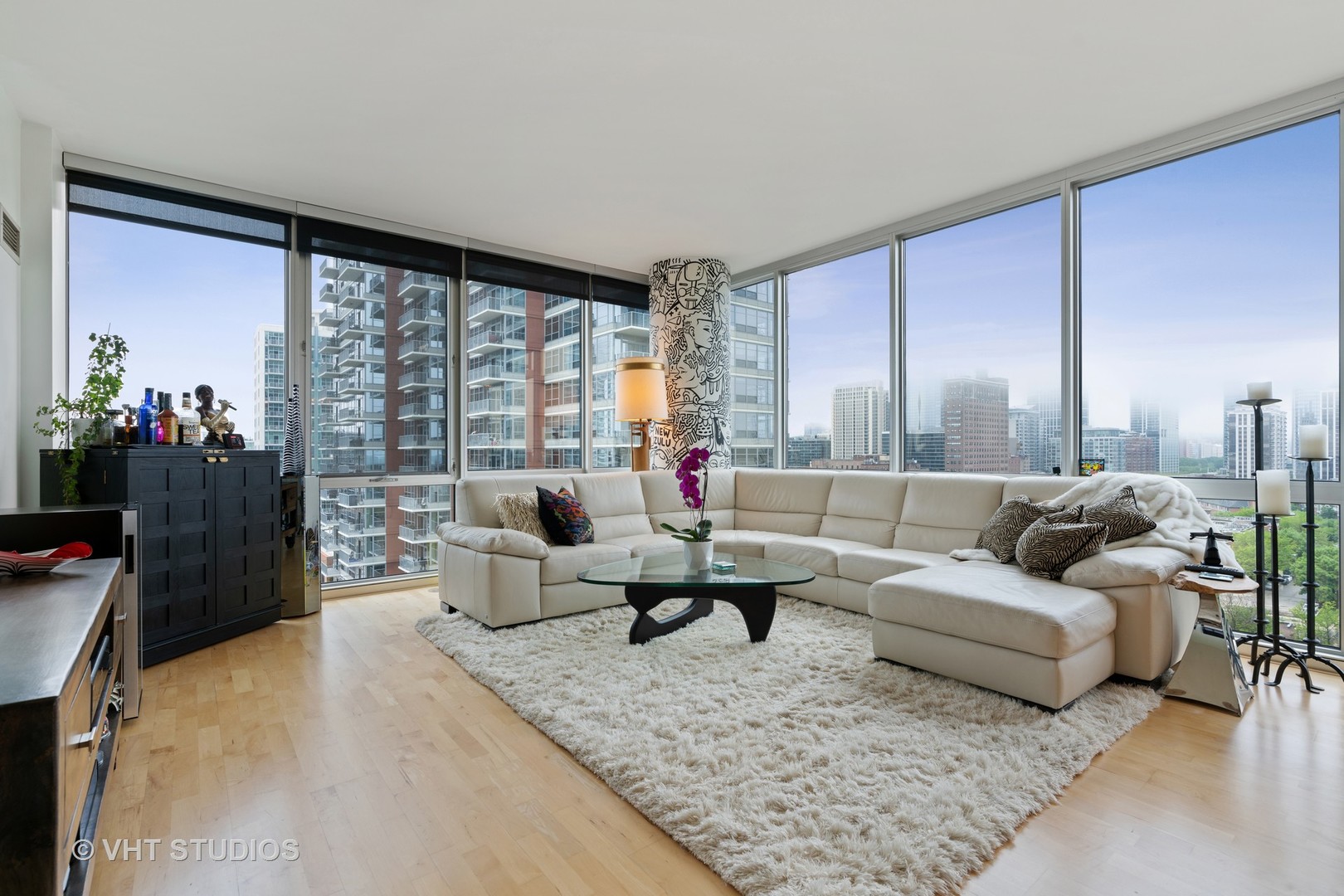1629 South Prairie Avenue, Unit 1111 Chicago, IL 60616 - Photo 3 of 13 a living room with furniture and a large window