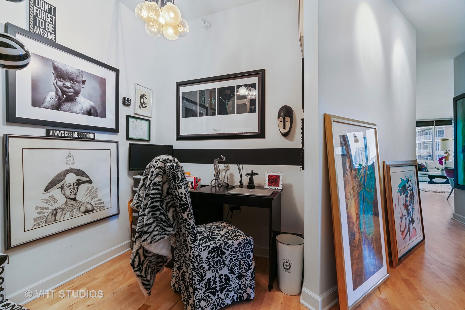 1629 South Prairie Avenue, Unit 1111 Chicago, IL 60616 - Photo 4 of 13 a bedroom with furniture and a fireplace