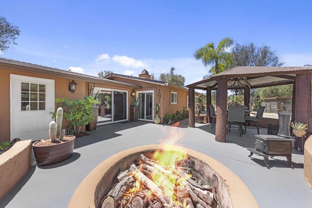 30265 Miller Road Valley Center, CA 92082 - Photo 6 of 56 a view of swimming pool with outdoor seating