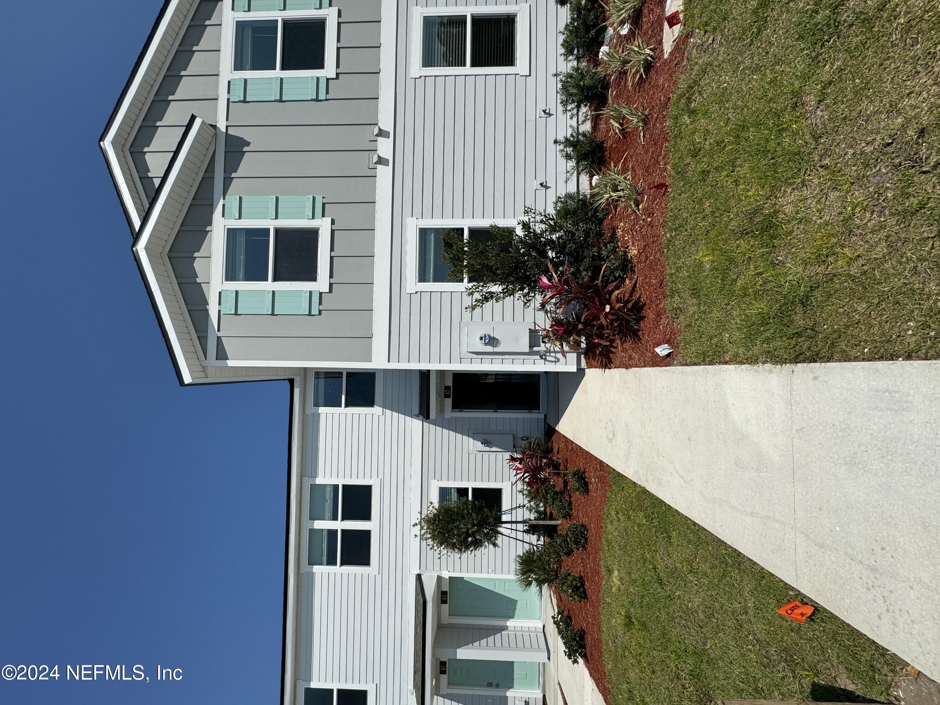 47 Hidden Mdws Road St. Augustine, FL 32095 - Photo 1 of 1 a front view of a house with a yard