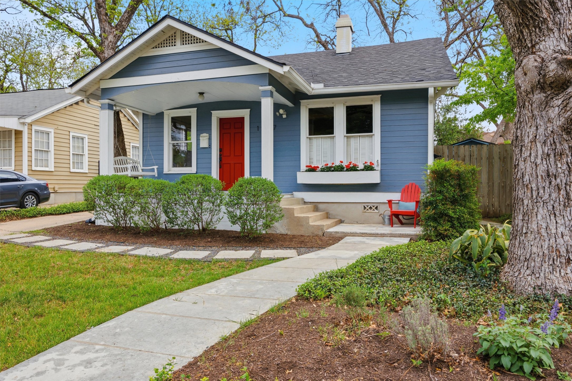 1507 Wethersfield Road Austin, TX 78703 - Photo 3 of 40 a front view of a house with a yard and potted plants