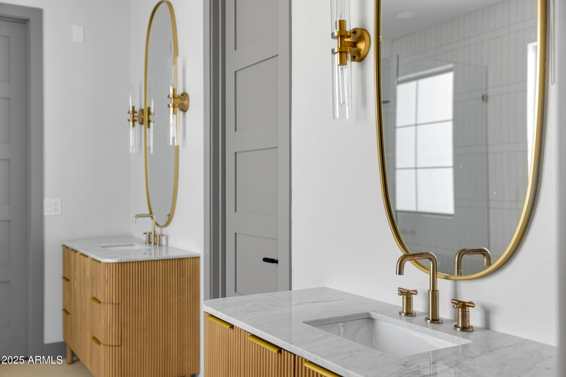 3102 East Agritopia Loop North Gilbert, AZ 85296 - Photo 21 of 75 a bathroom with a sink vanity and a mirror