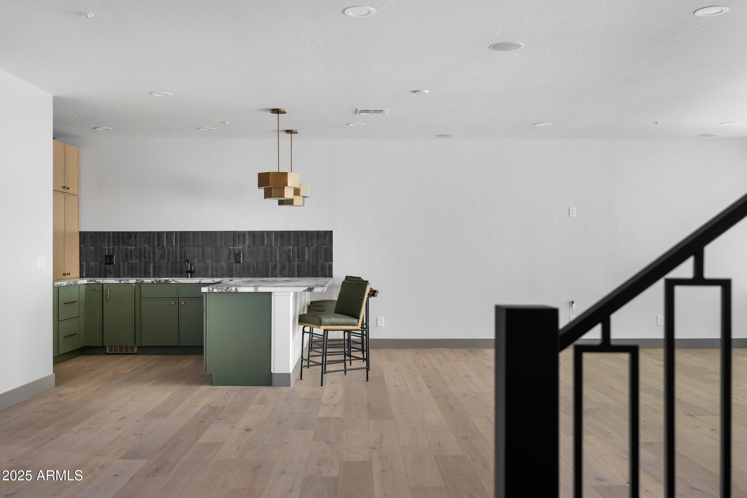 3102 East Agritopia Loop North Gilbert, AZ 85296 - Photo 31 of 75 a view of kitchen with furniture and fireplace
