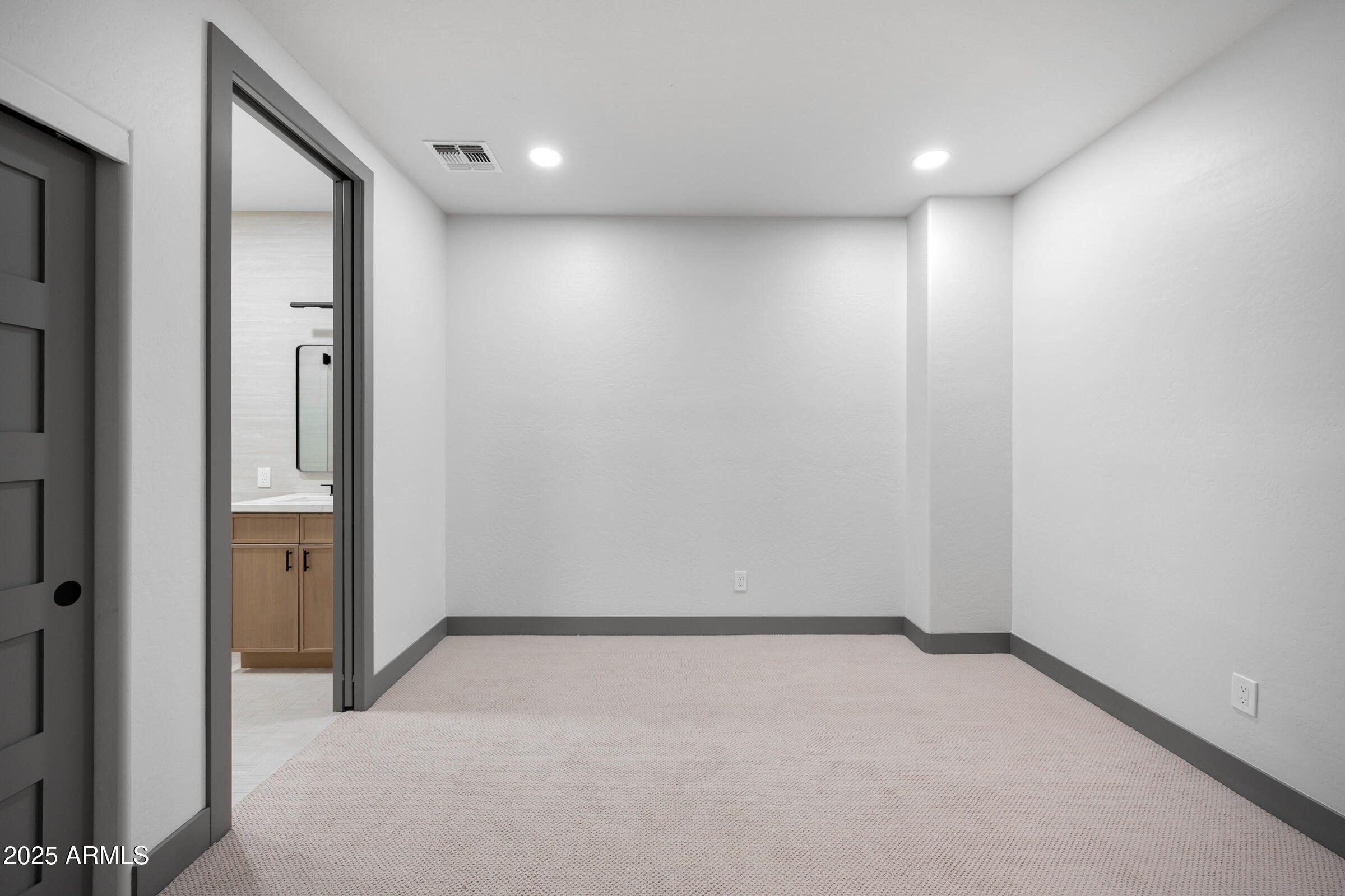 3102 East Agritopia Loop North Gilbert, AZ 85296 - Photo 34 of 75 an empty room with a mirror