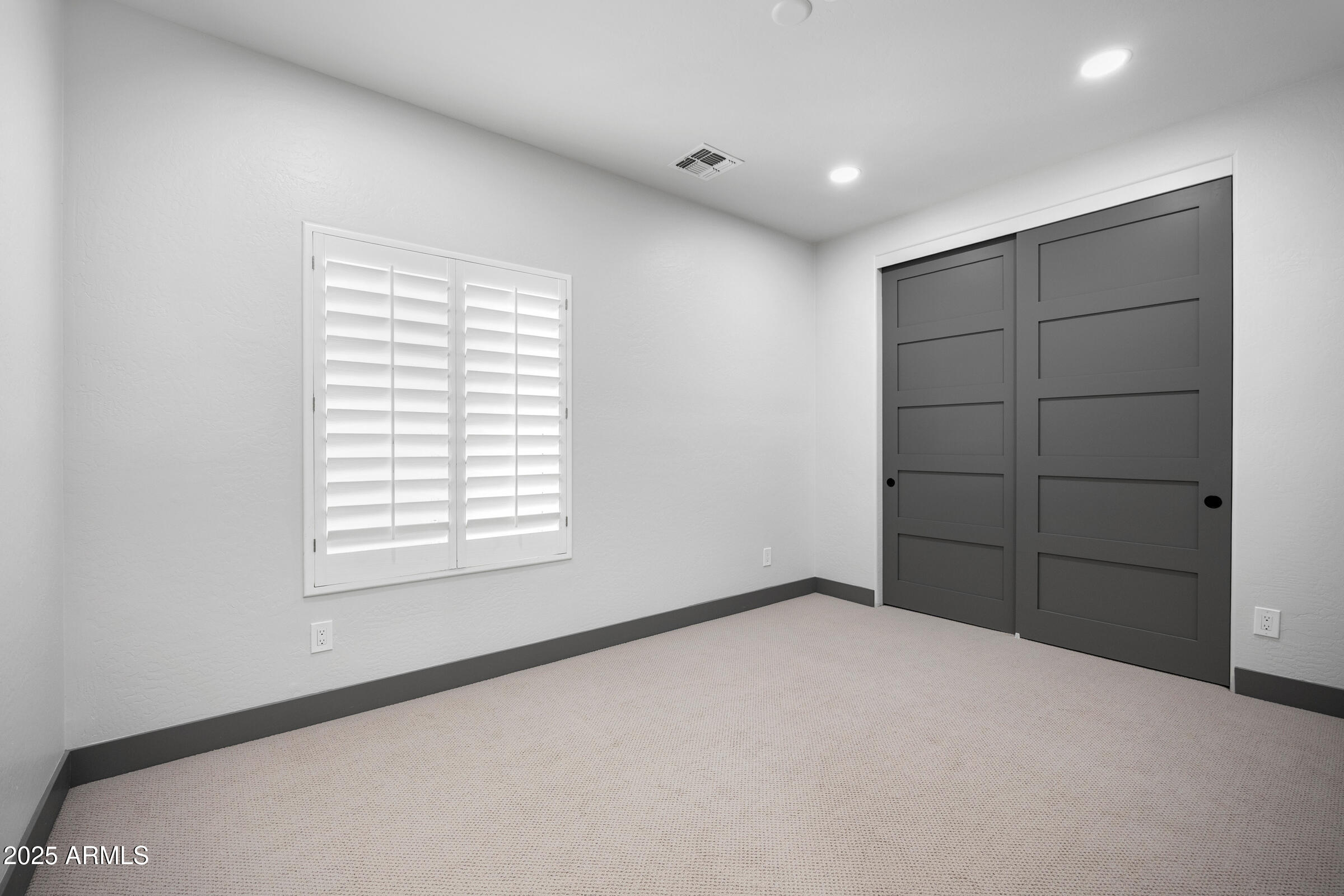 3102 East Agritopia Loop North Gilbert, AZ 85296 - Photo 36 of 75 a view of an empty room with a window
