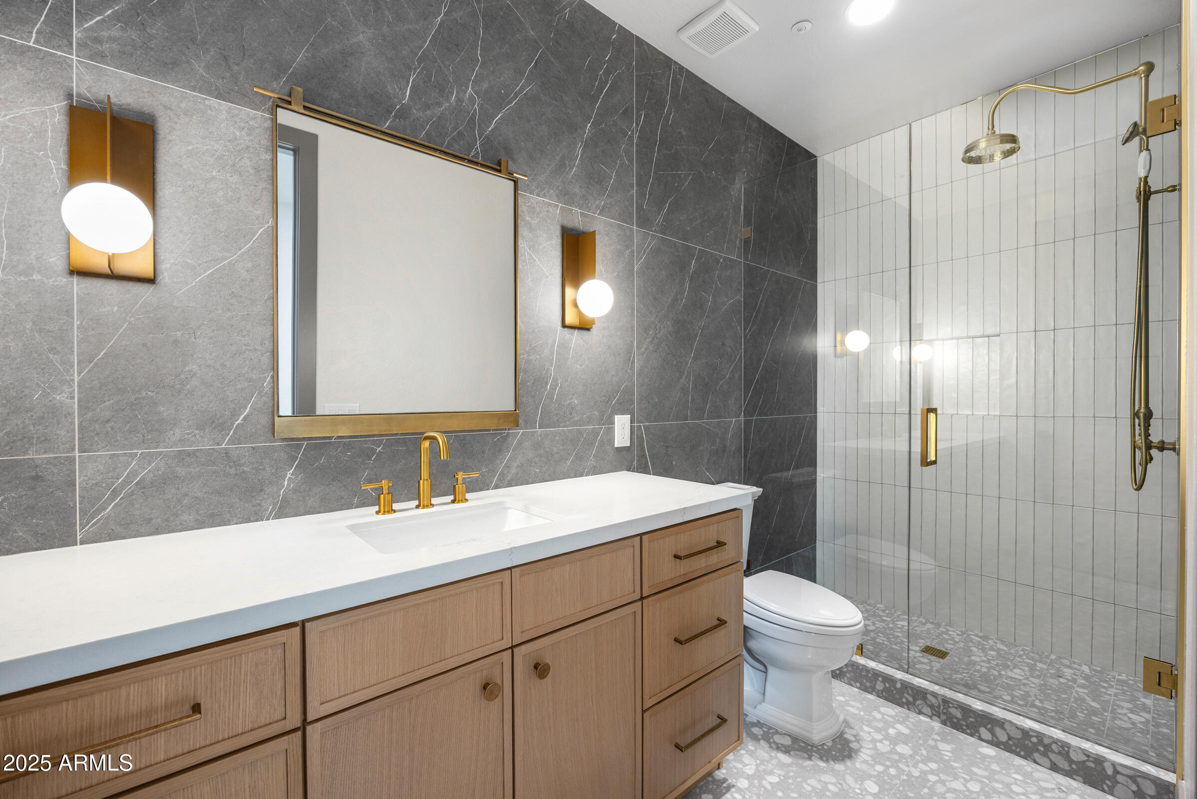 3102 East Agritopia Loop North Gilbert, AZ 85296 - Photo 37 of 75 a bathroom with a sink toilet and shower