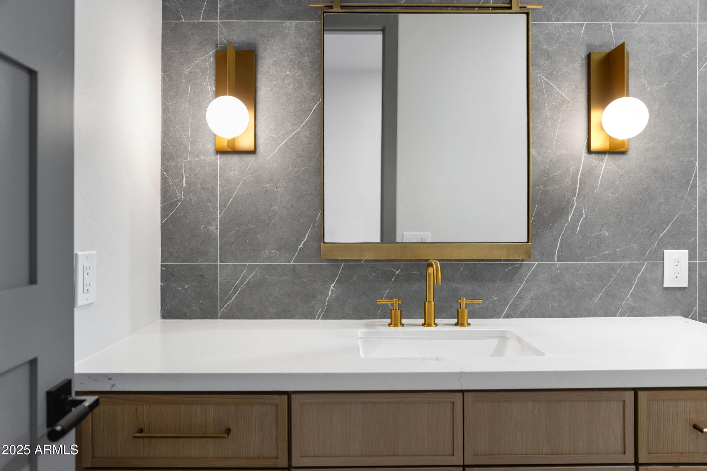 3102 East Agritopia Loop North Gilbert, AZ 85296 - Photo 38 of 75 a bathroom with a sink and a mirror